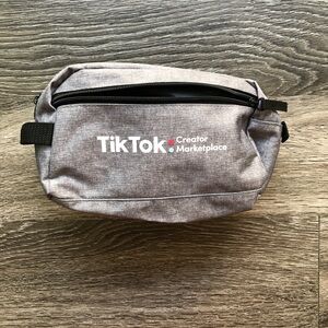 Gray Toiletries Bag with TikTok logo, fits SO MUCH!